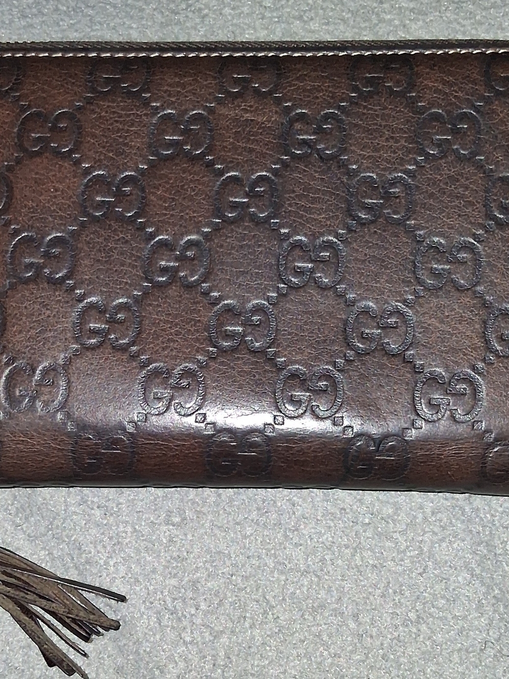 Gucci Brown GG Embossed Leather Wallet